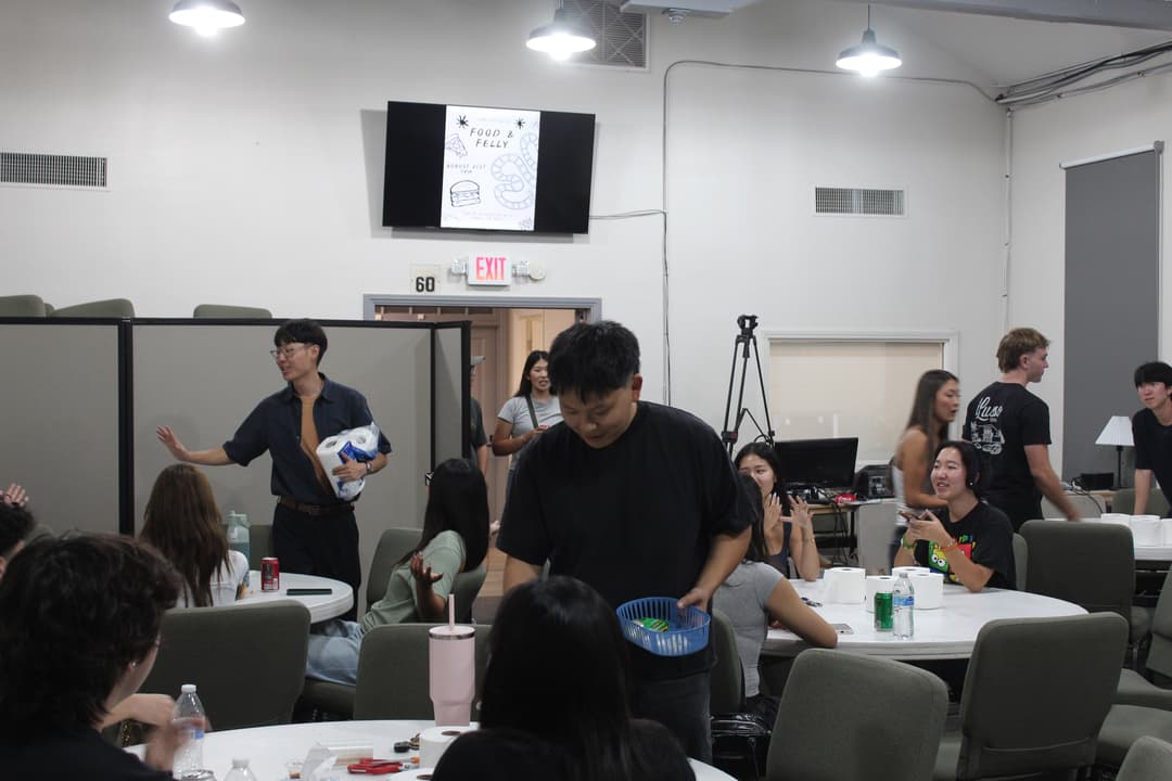 Students sharing a meal at a 1128 College night
