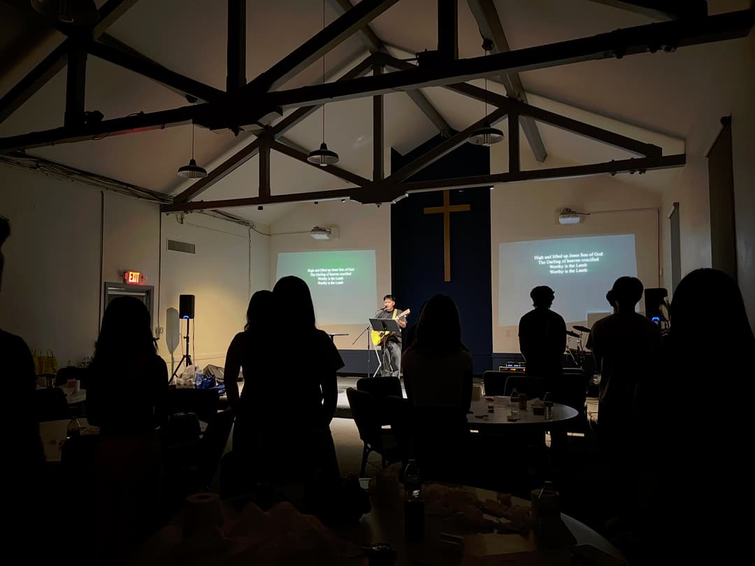 Worship during a Friday night 1128 College gathering